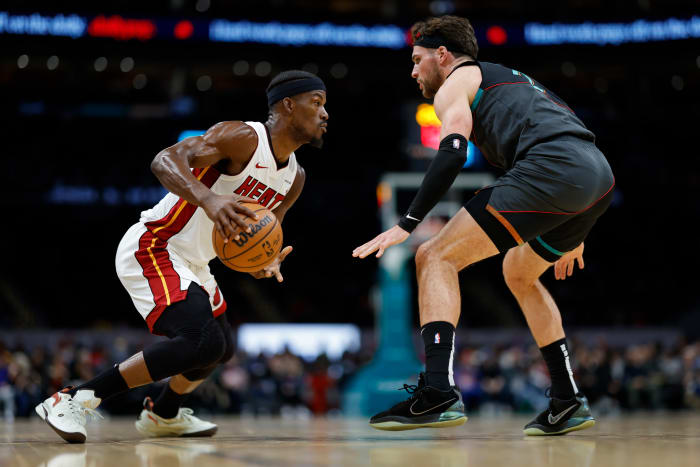 Miami Heat forward Jimmy Butler (22) drives to the basket as Washington Wizards forward Corey Kispert (24) defends in the first half at Capital One Arena. Mandatory Credit: Geoff Burke-USA TODAY Sports